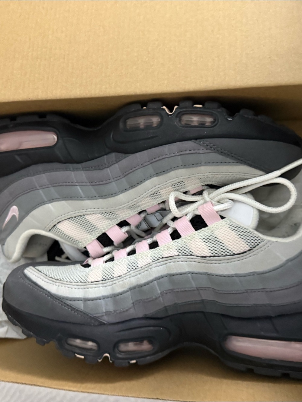 Pink and gray Nike air max